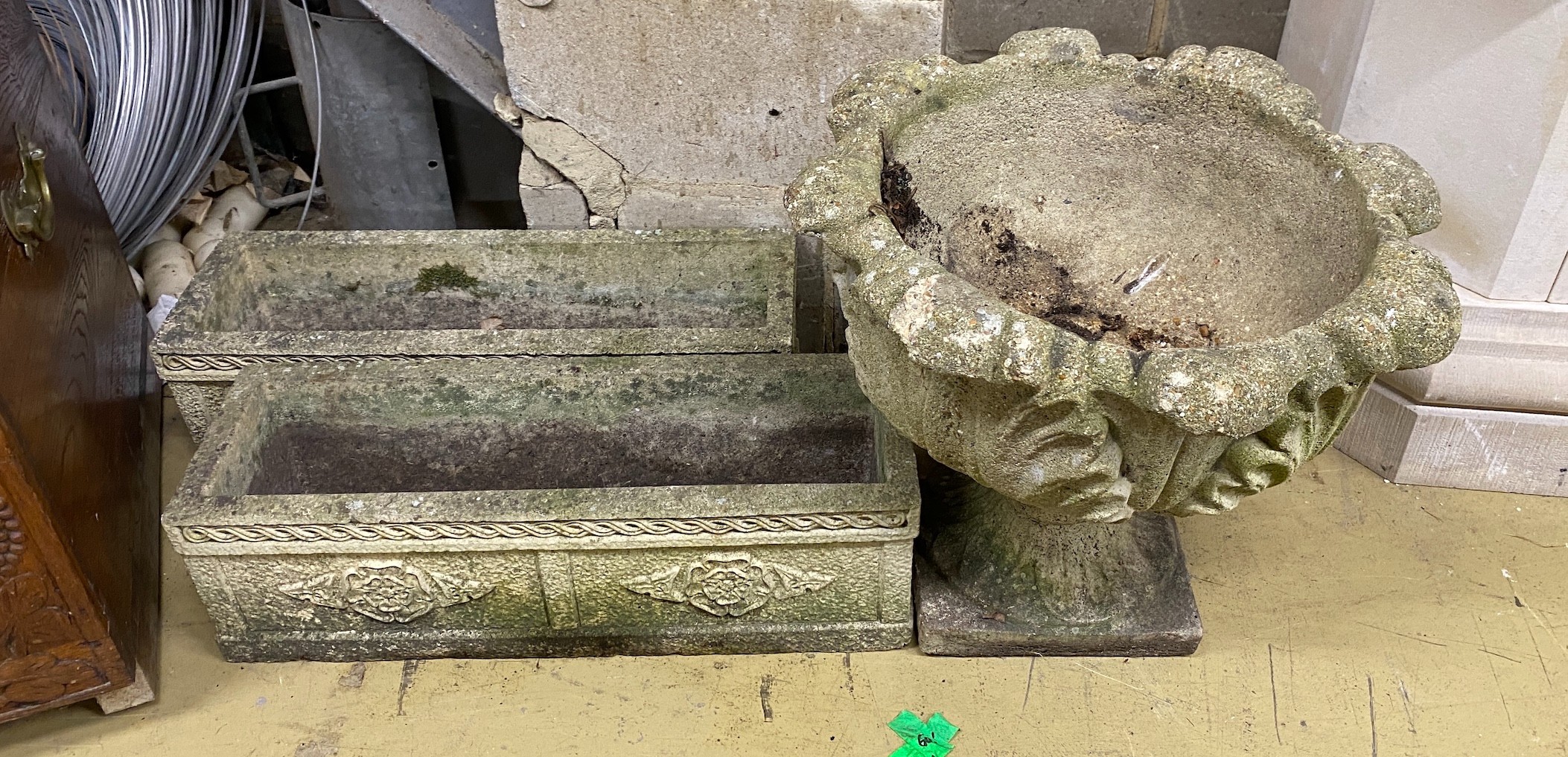 A pair of rectangular reconstituted stone garden planters, length 61cm together with a circular campana garden urn